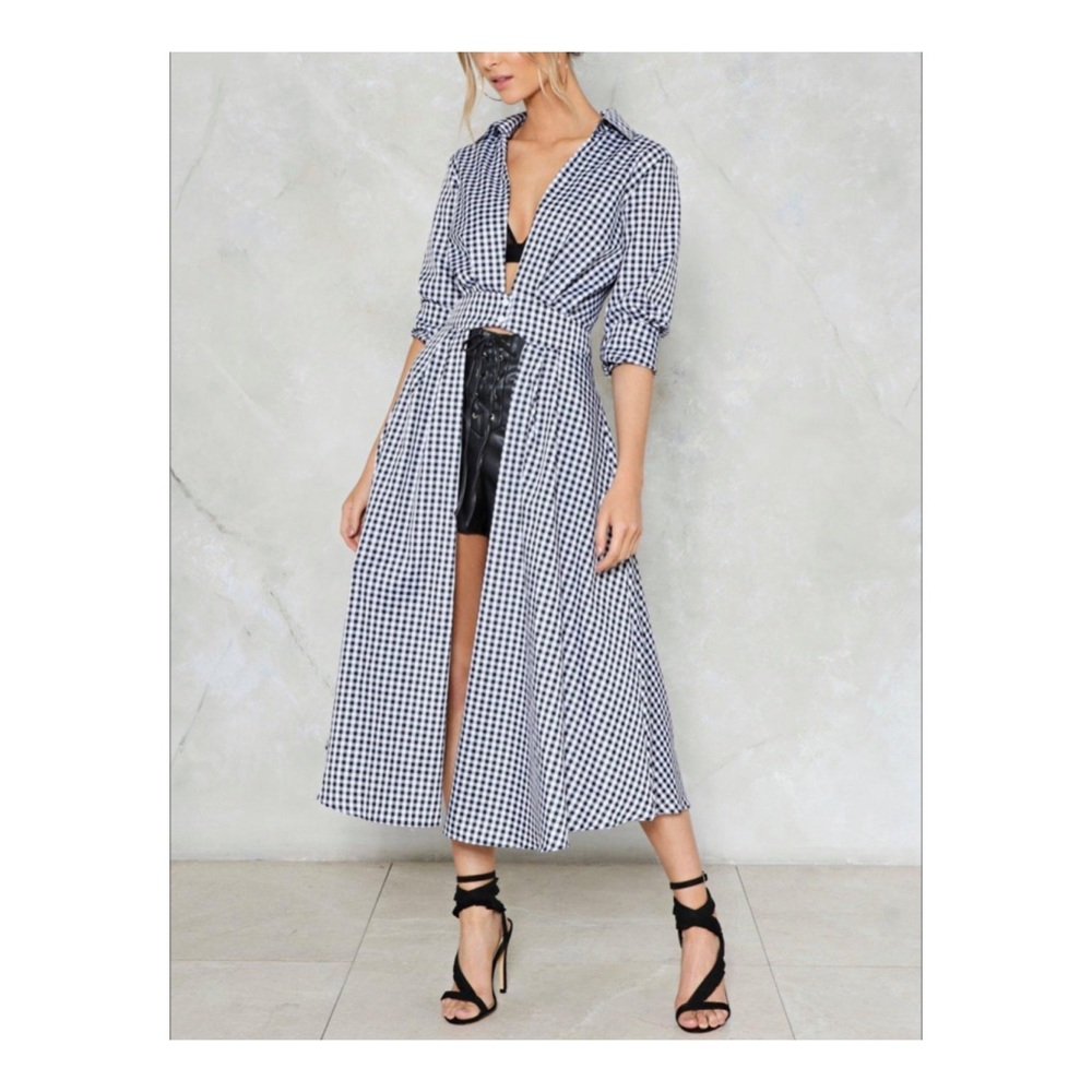 Woman’s black and white gingham blouse